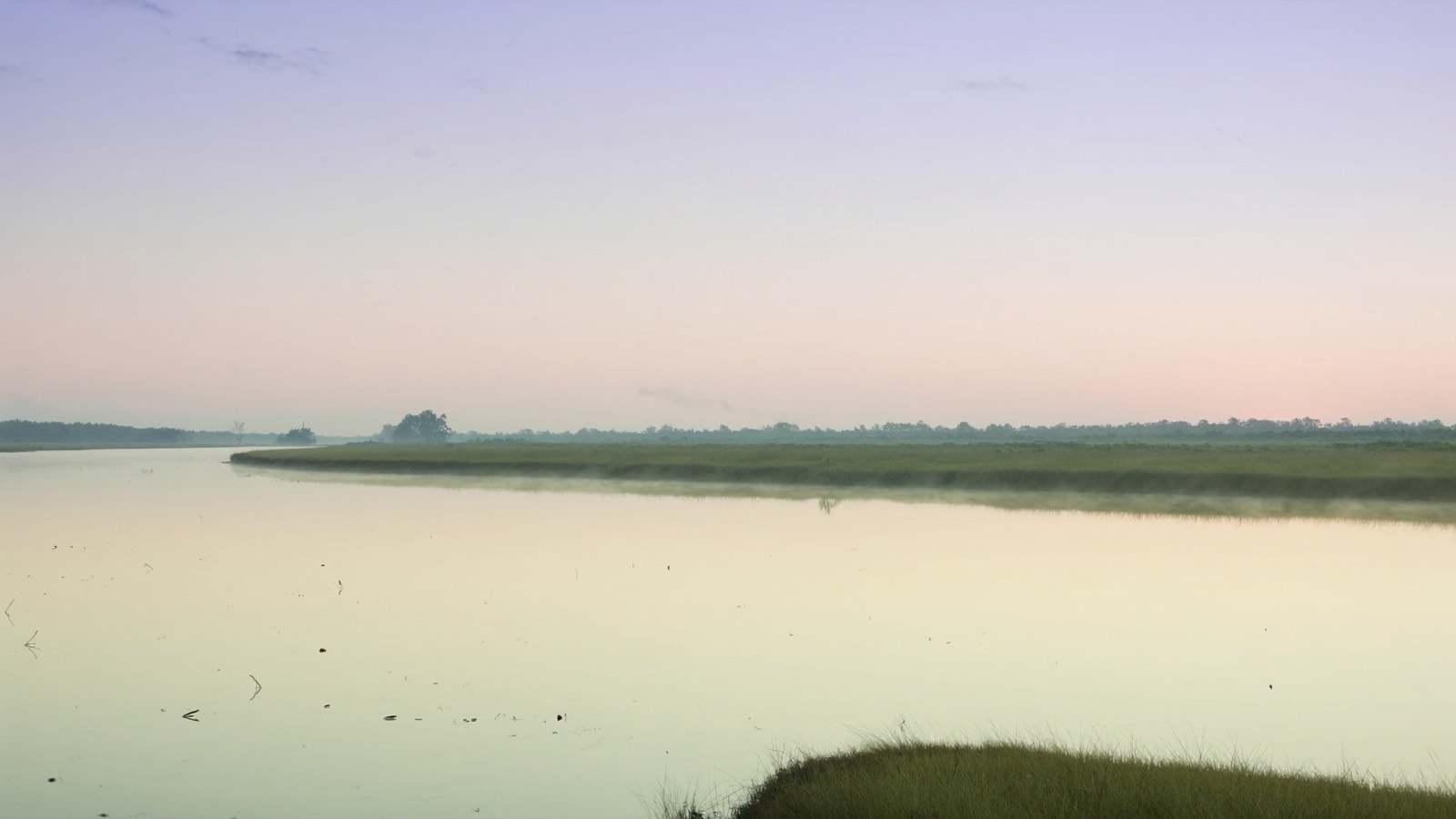 A calm Lowcountry tidal river at dawn